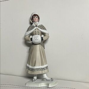 #24.Avon Winter Lady Figurine in Cream and Gray
